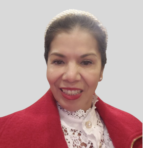 Portrait of a smiling woman wearing a red coat and a pearl headband